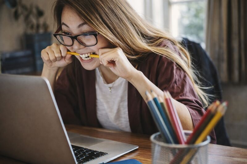 Student studying on MacBook